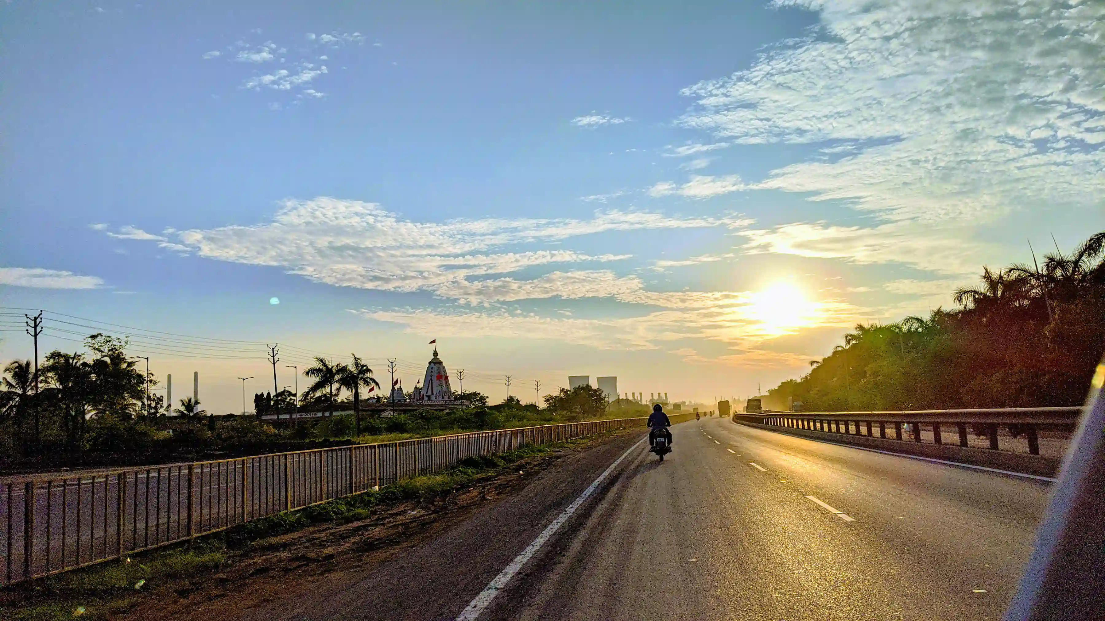 Sunlit road in Surat during golden hour